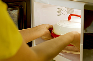 Putting Rocket Chef Turbo Grill in the microwave